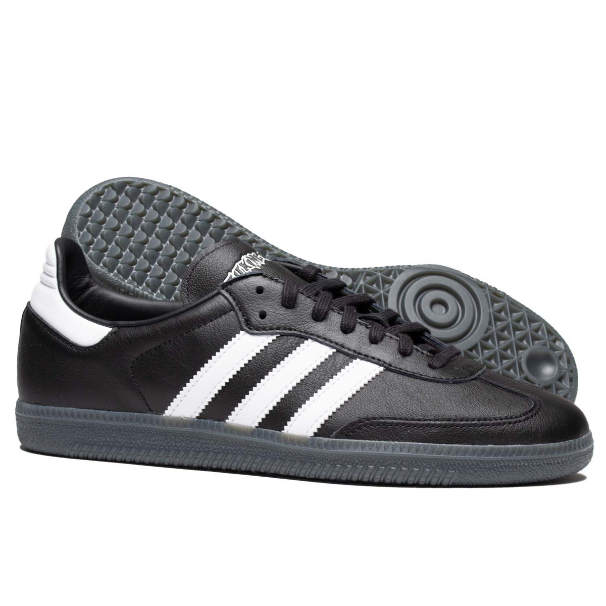 Adidas and Fucking Awesome Samba in black leather with white leather stripes and clear sole.