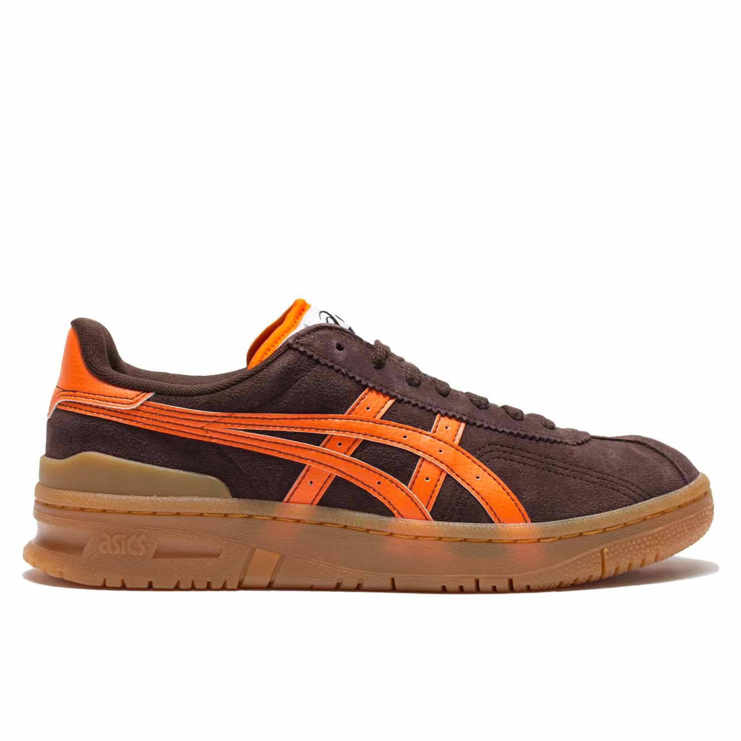 Asics Vic NBD in coffee colored brown suede. Orange leather accents on heel, and side. Orange leather Asics logo. Orange piping on white puffy tongue. Light brown slightly translucent sole.