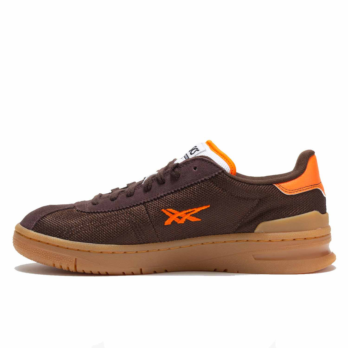 Asics Vic NBD in coffee colored brown suede.  Inside of shoe is mesh for breathability. Smaller embroidered Asics logo on inside of shoe. Orange leather accents on heel, and side. Orange leather Asics logo. Orange piping on white puffy tongue. Light brown slightly translucent sole.