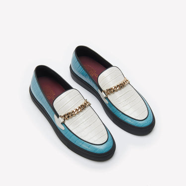 Humean recreational services el dorado loafer made with light blue and white croc leather and gold cuban link chain with black sole. 