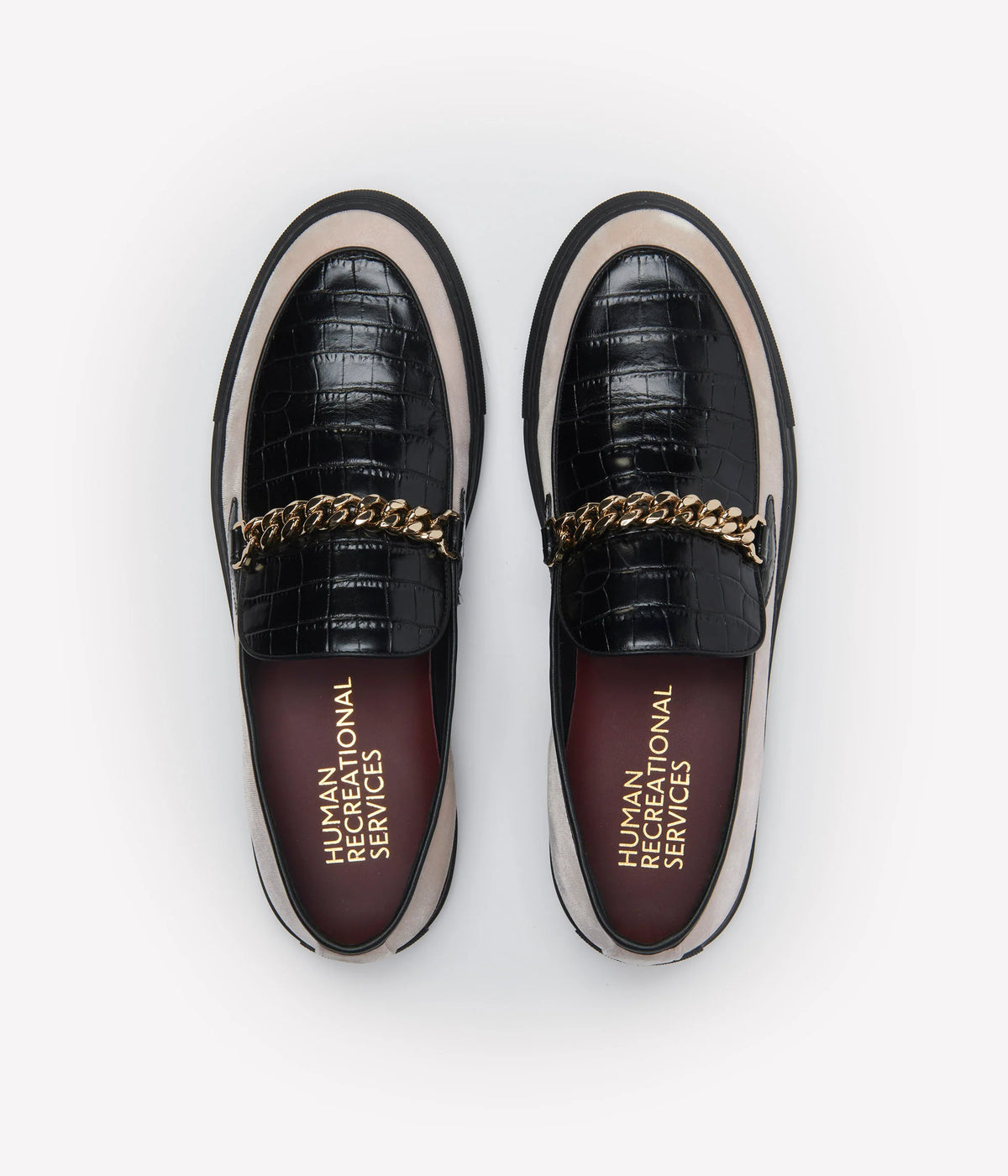 HUMAN RECREATIONAL SERVICES LOAFER WITH LIGHT PINK VELVET AND BLACK LEATHER WITH ADDED GOLD CUBAN LINK CHAIN.