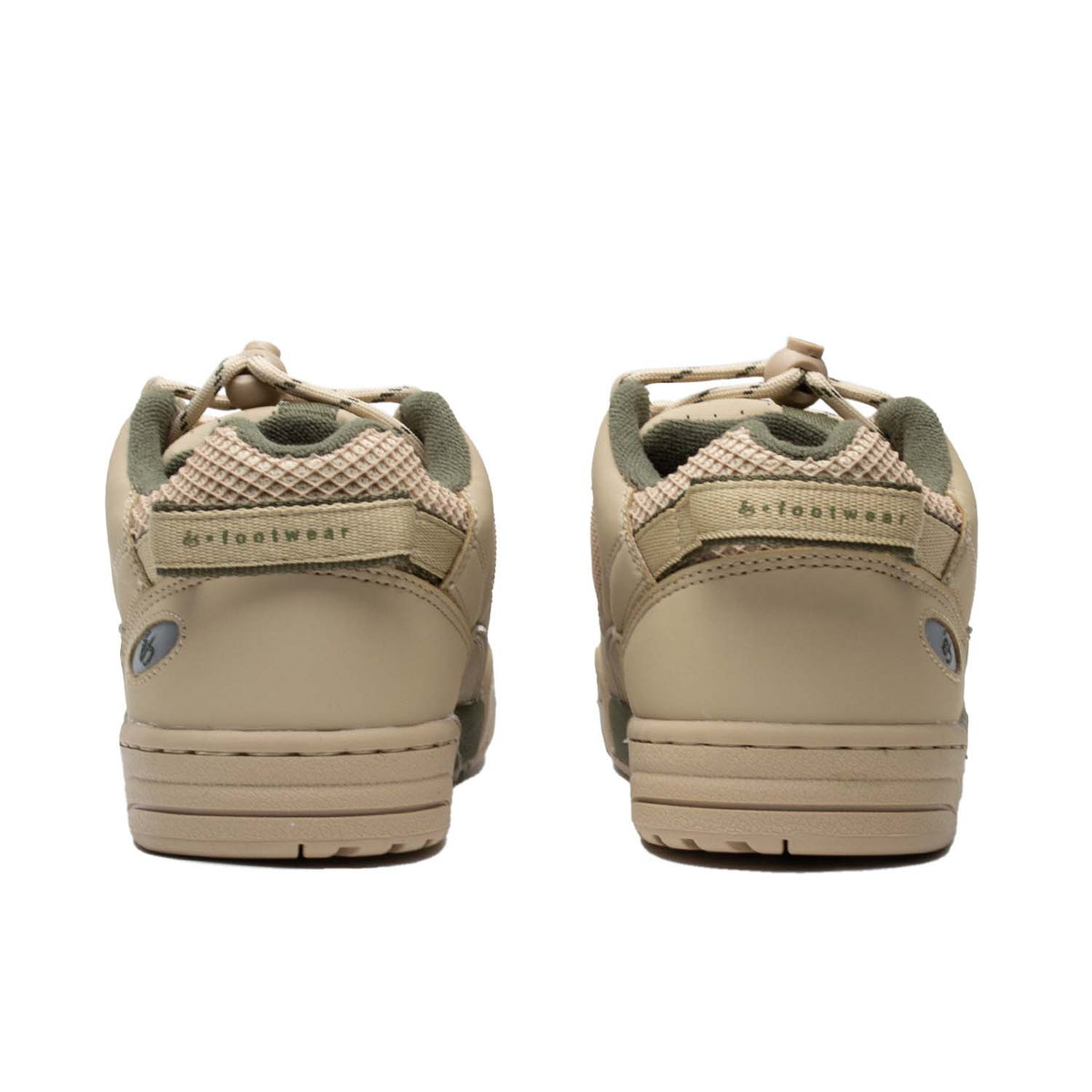 The Es Muska in tan and green, endorsed by Chad Muska, is the pinnacle of skateboarding footwear. Its PU cage and heel mesh offer durability, while the rubber toe cap and lace protection ensure longevity. Features like the hidden stash pocket, heel pull tab, and reflective logo on the heel add convenience and style. With a molded EVA footbed and 400 NBS rubber cupsole, it provides comfort and grip, ideal for skaters of all levels.