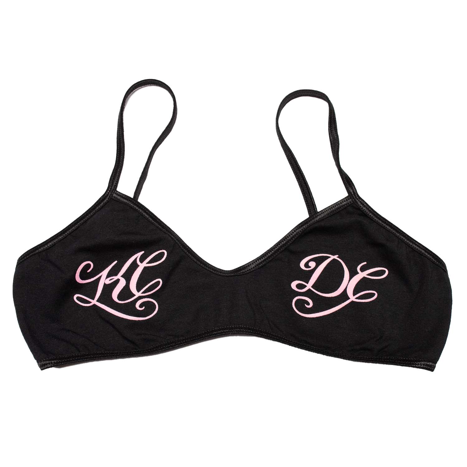 Black spandex spaghetti bralette with pink script printed, reading KC on the left breast, DC on the right breast. Pair with the KCDC bikini panty for the full set.