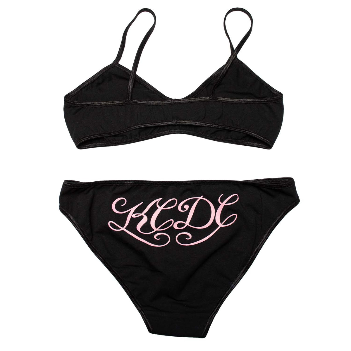 Black bikini panty with pink KCDC script printed on butt. Pair with black KCDC pink script print bralette for the full set. 