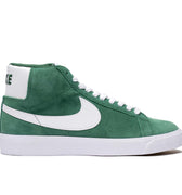 Nike Green suede high top skateboarding shoe with white Nike swoosh, white laces, and white sole. 