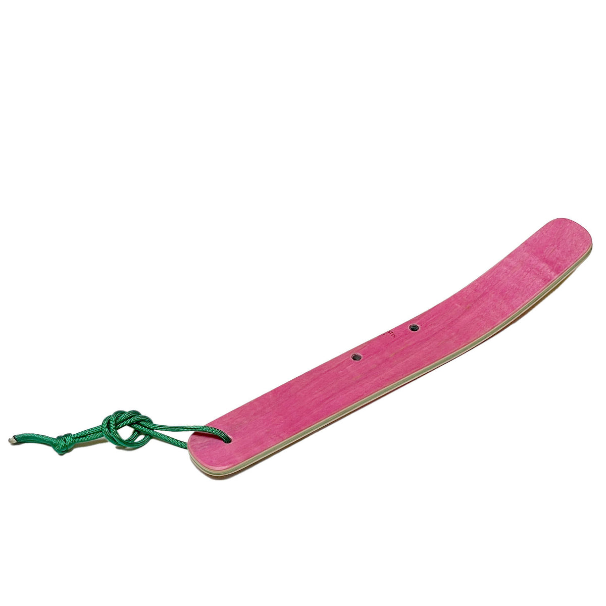 Shoe horn made of recycled skateboards in pink.